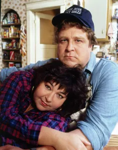 Barr Prints: ROSEANNE, from left: Roseanne Barr, John Goodman, (Season 1, 1988-89), 1988-97