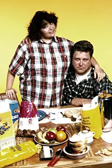 Plaid Shirt Prints: ROSEANNE, from left, Roseanne, John Goodman, 1988-2018 (1988 photo)