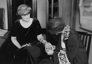 Flapper Prints: Roxie Stinson having her fortune told after delivering sensational testimony at the Senate investigations of the Teapot