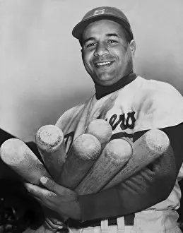 Brooklyn Prints: Roy Campanella, catcher for the Brooklyn Dodgers, holding six bats, June 4, 1953