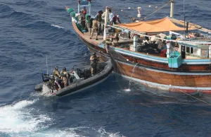 Narcotics Prints: A Royal Navy boarding team looking for narcotics inspects a suspect Dhow in the Persian Gulf