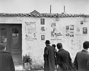 Rightist Prints: Royalists political posters plastered on the outside wall of a tavern