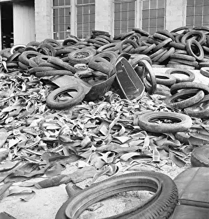 Rationing Prints: Rubber tires gathered to be recycled in August