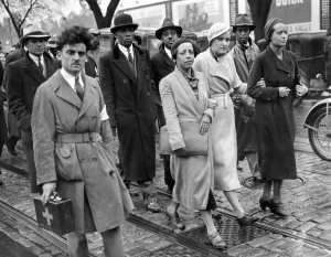 Rape Prints: Ruby Bates, one of the two original alleged victims in the Scottsboro case walks between two African American women