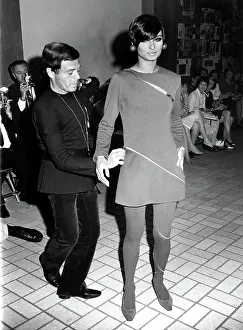 Model Prints: Rudi Gernreich dressing a model at a New York fashion show