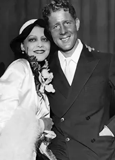 Actor Prints: Rudy Vallee (right), and his wife