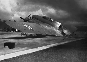 Hawaii Prints: Ruins of a B-17C aircraft rests near at Hickam Field after the Japanese attack on Pearl Harbor