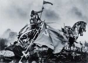 Hamer Prints: Russian soldiers raise the Soviet Flag next to the battered sculptures of the Brandenburg Gate in the final European