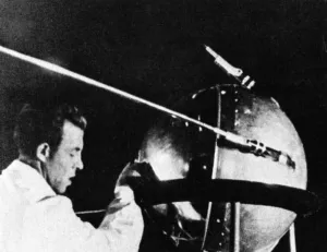 Soviets Prints: Russian technician with Sputnik 1
