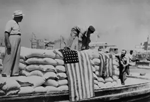 Rightist Prints: Sacks of flour, the first relief supplies from the United States