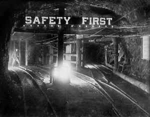 Warning Prints: Safety sign in a coal mine, photograph circa 1908-1919