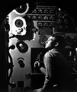 Control Panel Prints: Sailor at work in the electric engine control room of USS BATFISH on submarine war patrol