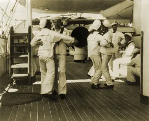Images Dated 9th June 2008: Sailors aboard the USS OLYMPIA waltzing at tiffin (lunch time), 1899