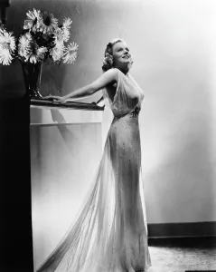 December Prints: SARATOGA, Jean Harlow, in a gown by Dolly Tree, 1937