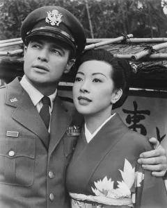 Images Dated 16th July 2015: SAYONARA, from left: Marlon Brando, Miiko Taka, 1957
