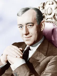 Sitting In Chair Prints: THE SCAPEGOAT, Alec Guinness, 1959