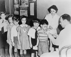 Vaccines Prints: School children waiting in line for immunization shots at a child health station in New York City