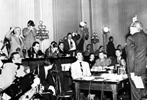 Adolphe Prints: Screen actor Adolphe Menjou (right) is sworn in to testify before HUAC