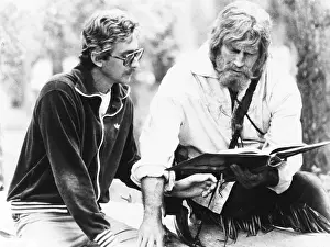 Professions Prints: Screenwriter Fraser Clark Heston (left) discusses a scene with his father