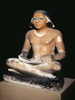 Saqqara Prints: Scribe seated cross-legged holding a papyrus scroll