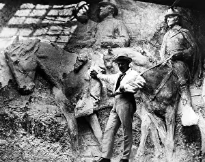 Sculptor Prints: Sculptor Gutzon Borglum in his studio with a clay model of a Confederate memorial to be carved near Atlanta