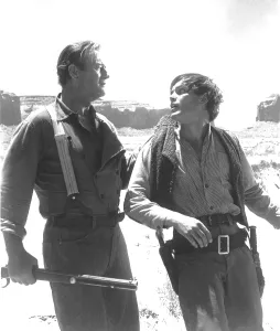 Grabbing Shirt Prints: THE SEARCHERS, John Wayne, Jeffery Hunter, 1956