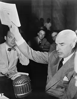 Delegates Prints: Secretary of State Edward Stettinius at a Senate Foreign Relations Committee meeting