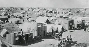 Migration Prints: A section of Guthrie, Oklahoma with a combination of wood buildings and tents