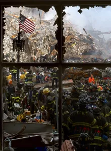 Images Dated 16th March 2011: Seen through a broken window New York City firemen