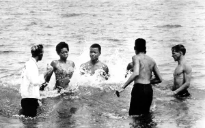 Civil Rights Prints: Segregation, African American boys and girls attempt to integrate a beach and are forced to leave Savannah Beach