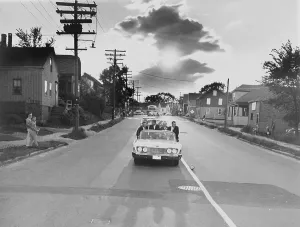 Maine Prints: Senator John F. Kennedy campaigning on the empty streets of Portland