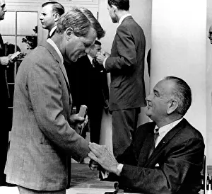 Robert F Prints: Senator Robert F. Kennedy shakes hands with President Lyndon Johnson