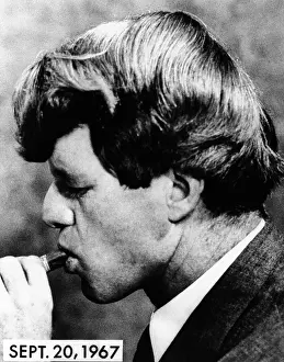 Tobacco Prints: Senator Robert Kennedy sporting stylishly longer hair in April 1967
