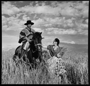 Wheat Prints: Senora Maria Vial de Prieto petting gaucho's horse Prique in a wheat field in Chile