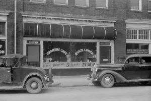 North Carolina Prints: Separate entrances for Whites and Colored to a cafe near Durham, North Carolina. May 1940