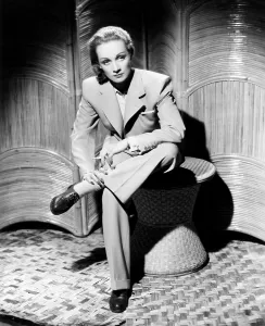 Cross Dressing Prints: SEVEN SINNERS, Marlene Dietrich, in a beige wool suit, 1940