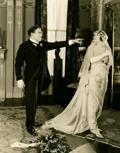 Long Gloves Prints: SHACKLES OF GOLD, left: William Farnum, 1922