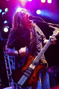 Groups Prints: Shaun Morgan Welgemoed of the rock group Seether plays for Marines Sailors