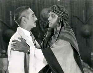 Rudolph Prints: THE SHEIK, from left, Adolphe Menjou, Rudolph Valentino, 1921