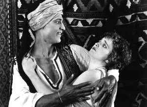 Rudolph Prints: THE SHEIK, from left: Rudolph Valentino, Agnes Ayres, 1921