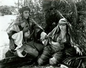 Rudolph Prints: THE SHEIK, from left, Rudolph Valentino, Agnes Ayres, 1921