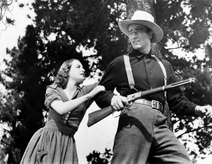 Suspenders Prints: THE SHEPHERD OF THE HILLS, from left, Betty Field, John Wayne, 1941