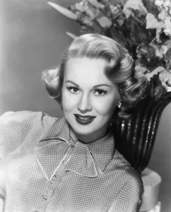 Images Dated 7th October 2015: SHE'S WORKING HER WAY THROUGH COLLEGE, Virginia Mayo, 1952