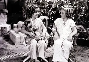 Christmas Tree Prints: Shirley Temple with doll on the set with her stand-in Mary Lou Isheb