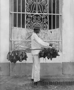 Shoe Prints: The shoe vendor, photograph circa 1895-1920