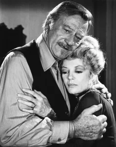 Sheree Prints: THE SHOOTIST, from left: John Wayne, Sheree North, 1976