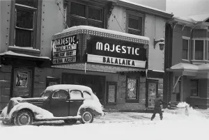 Marquee Prints: Shoveling snow away from the movie entrance of the Majestic theater