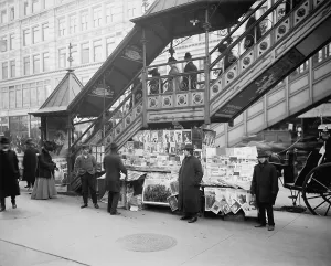 Retail Prints: A sidewalk newsstand in New York City located at the entrance stairway to the elevated train