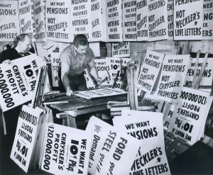 Michigan Prints: Sign contractor Stanley Sawicki and his helper Stanley Palka getting signs ready for a possible walkout of 89