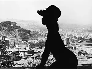 Brigitte Prints: Silhouette portrait of French Actress Brigitte Bardot against a view of Spoleto